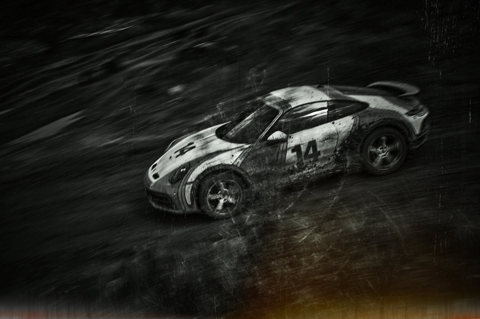 beaztiful structured BW Photo of a racing Porsche 911 Dakar