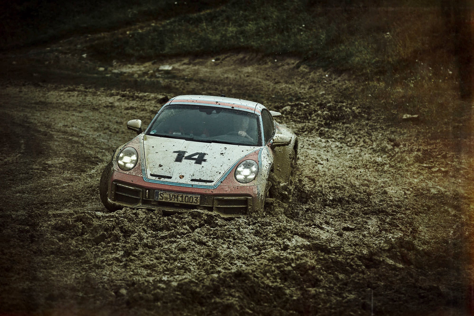 Fine art photo by Frank Kayser – Porsche 911 Dakar diving deep into thick mud.