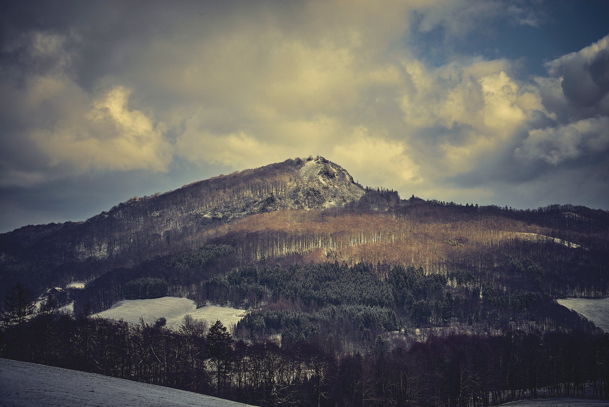 Fine art photography by Frank Kayser – the Milseburg, the most beautiful mountain of the Rhön, under dramatic skies.