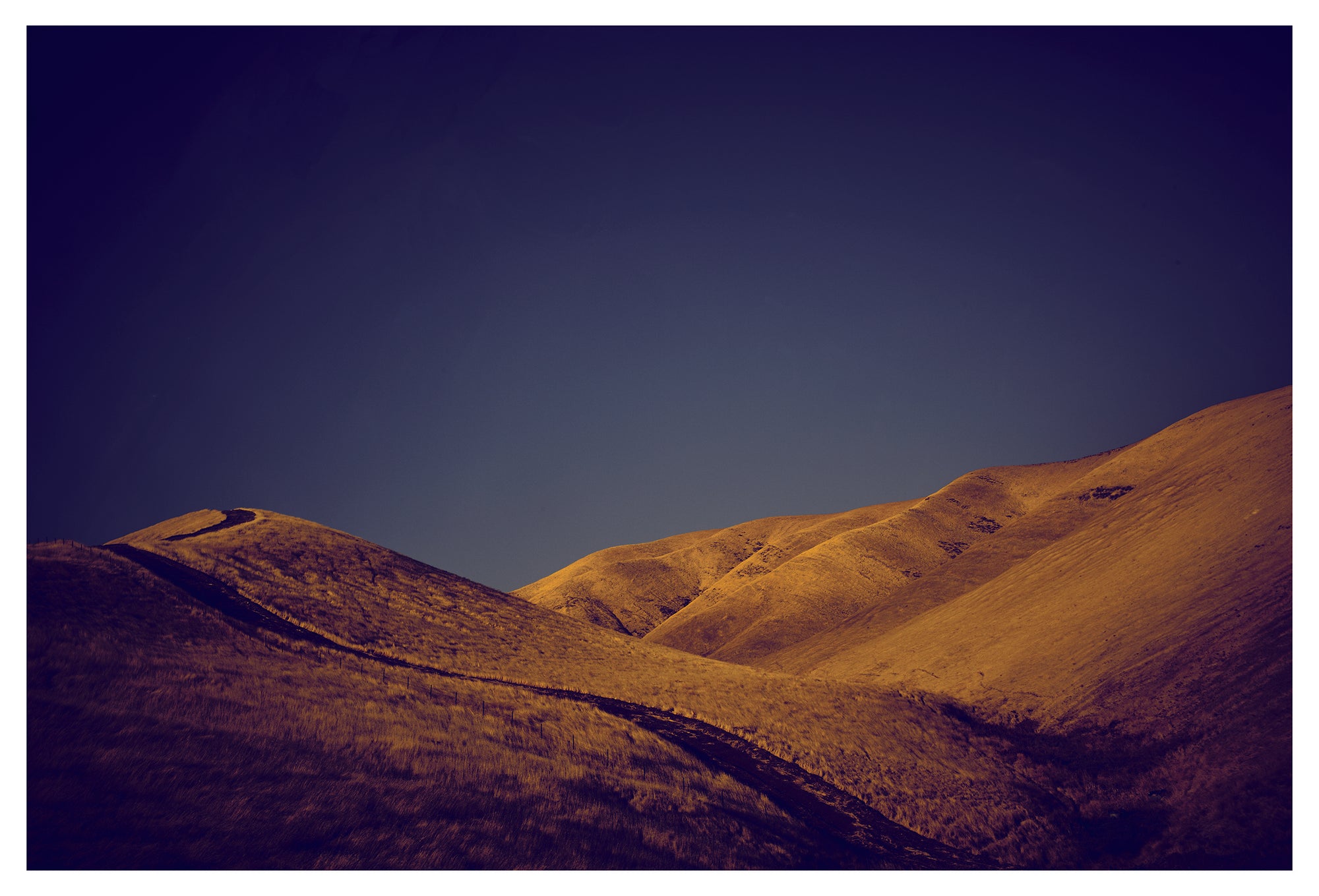 Golden California hills under deep blue sky – fine art landscape print