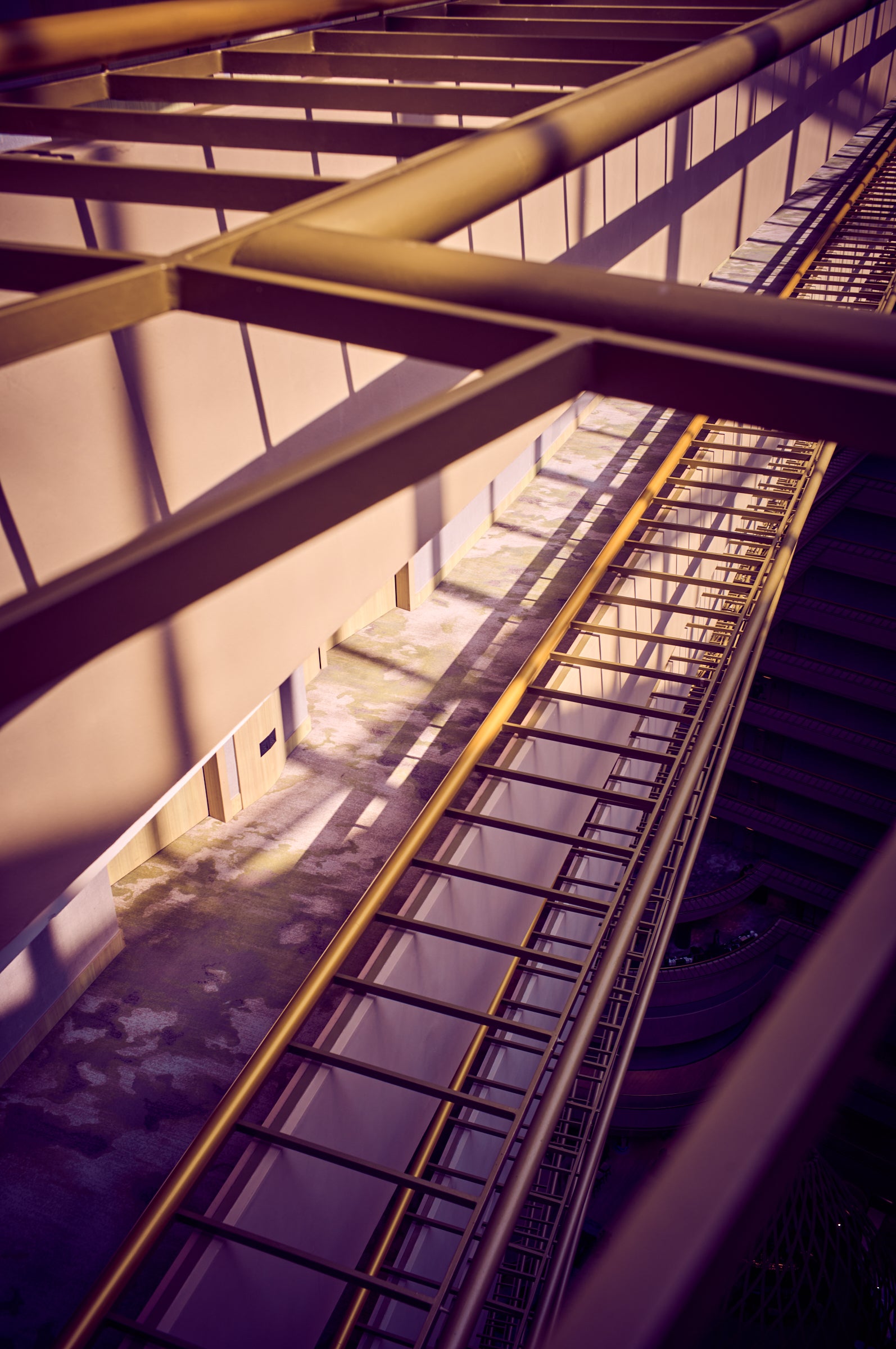 Abstract architectural beams and shadows in a high-rise atrium, Singapore — fine art photograph by Frank Kayser.