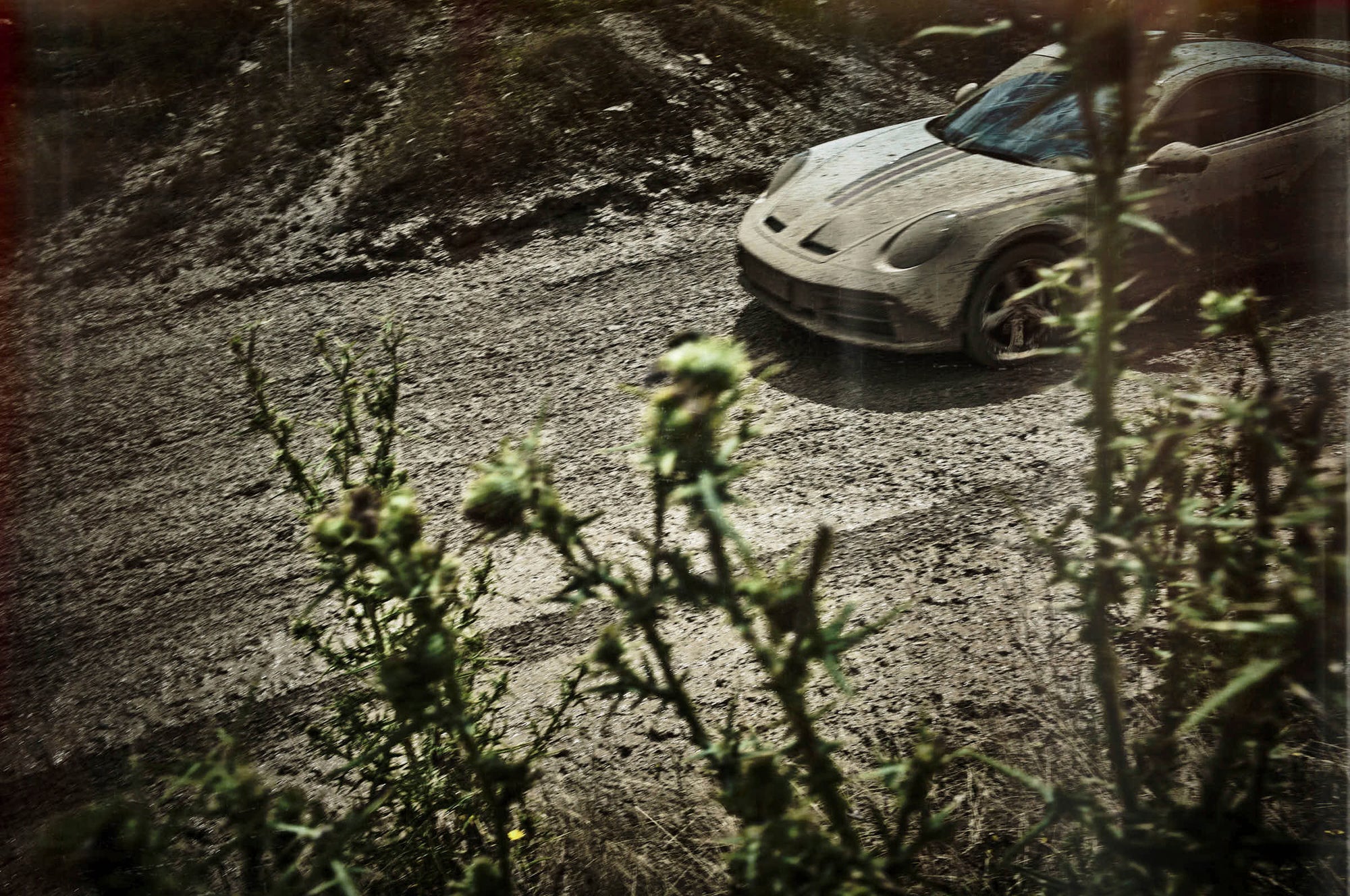 911 Dakar on muddy track