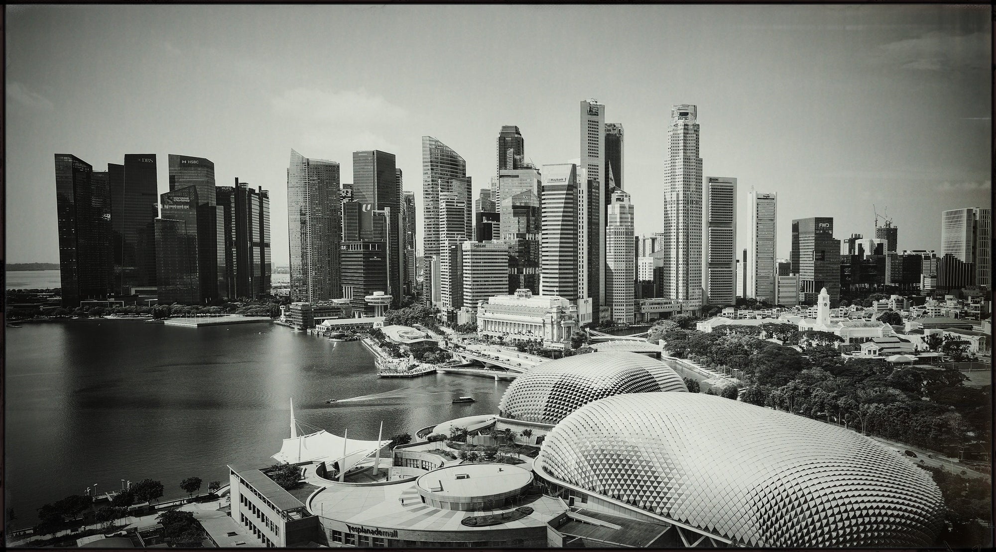 Fine art photography print by Frank Kayser – dramatic black and white panorama of Singapore skyline seen from rooftop perspective, limited edition cityscape artwork.