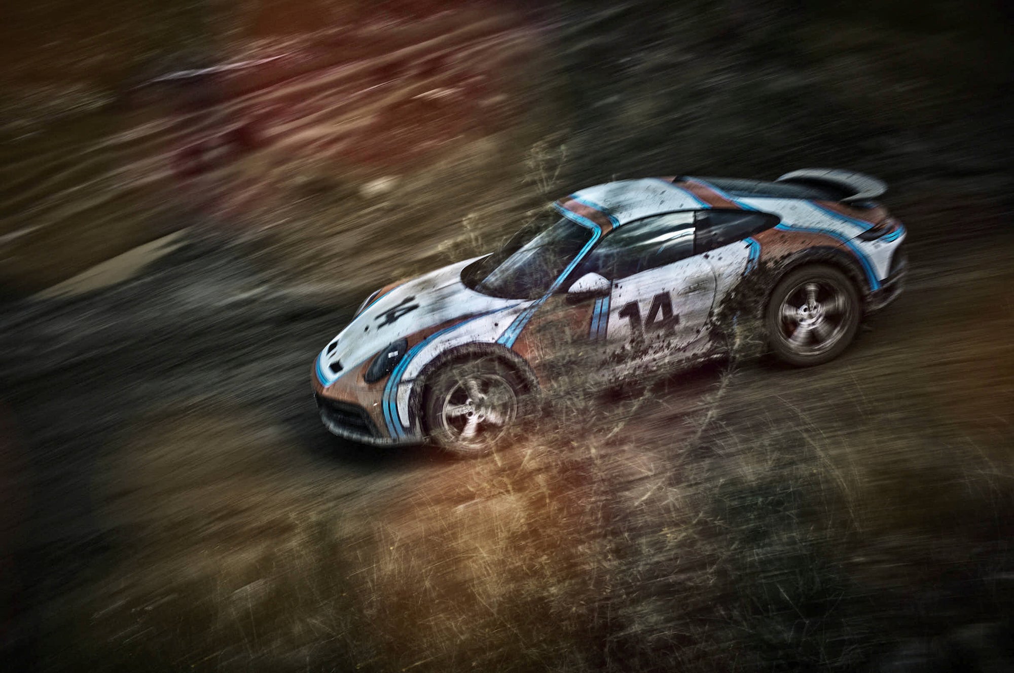 side shot of a racing Porsche 911 Dakar in the woods